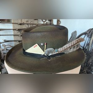 Custom burned hat with Navajo armadillo